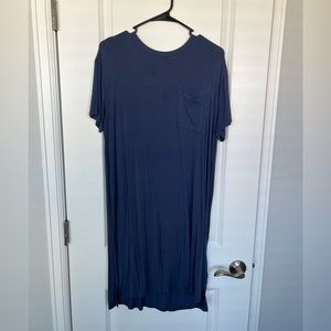 Navy swing dress hits at knees